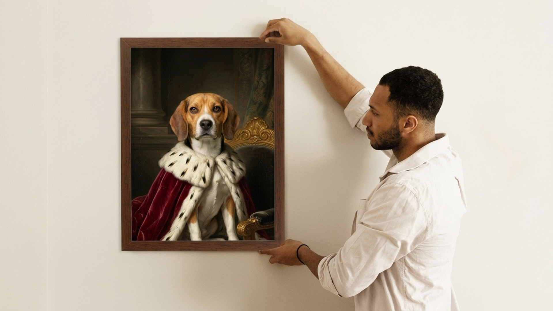 A man holding frame of dog portrait